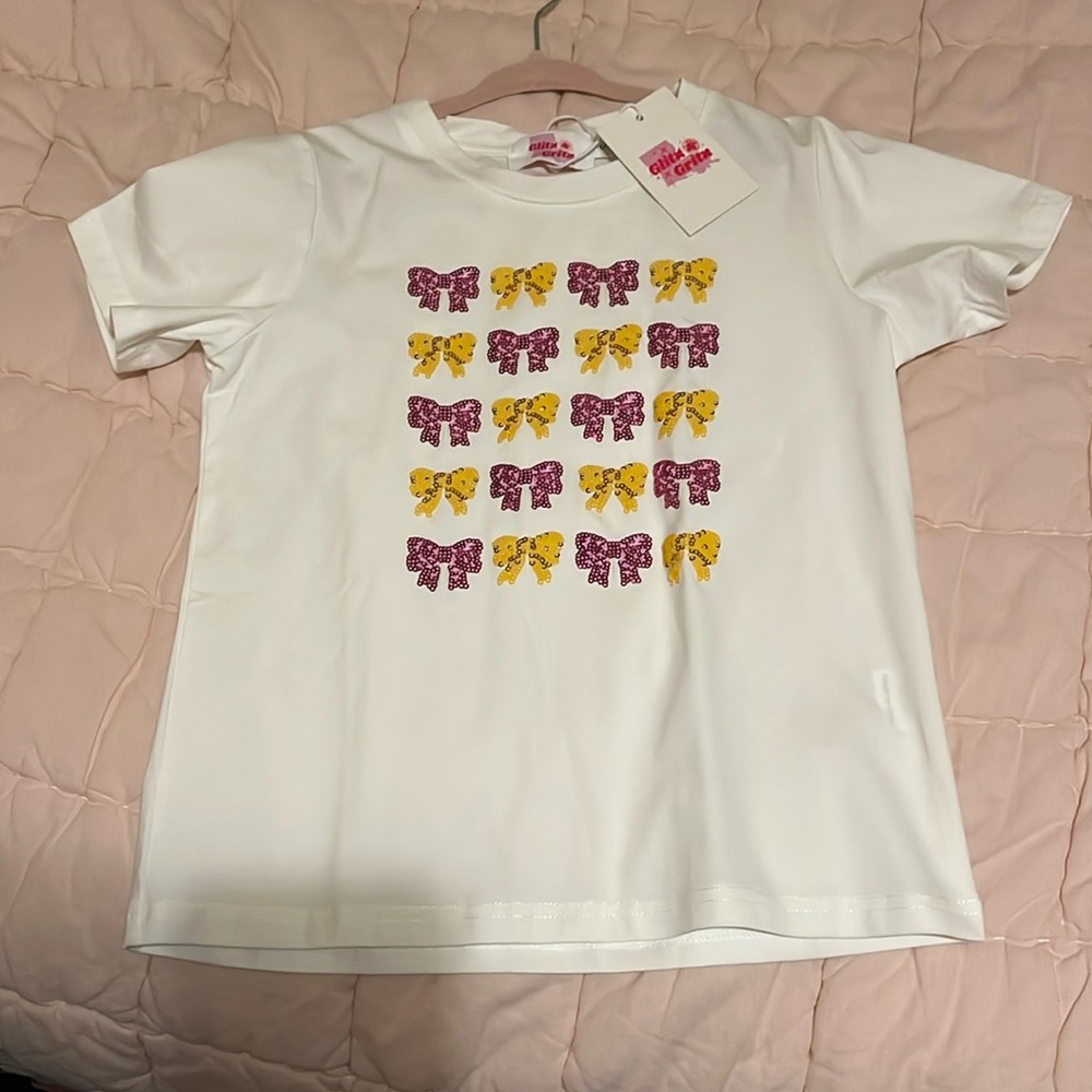 LSU, or even Mardi Gras!! For little girl!